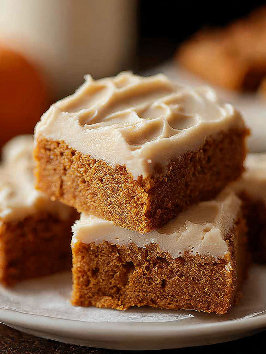 A close up of a dessert with a white frosting.