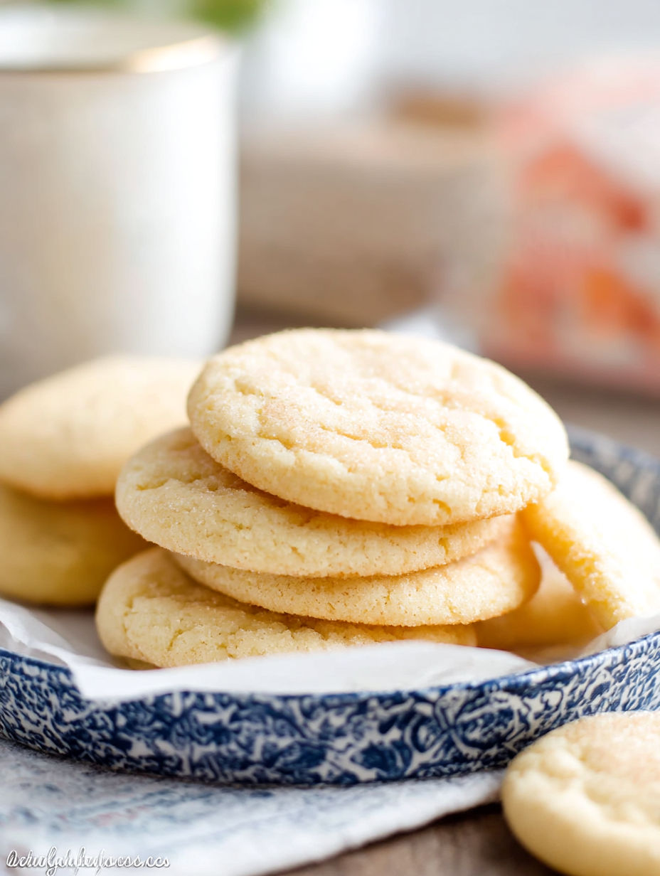 A stack of cookies on a plate.