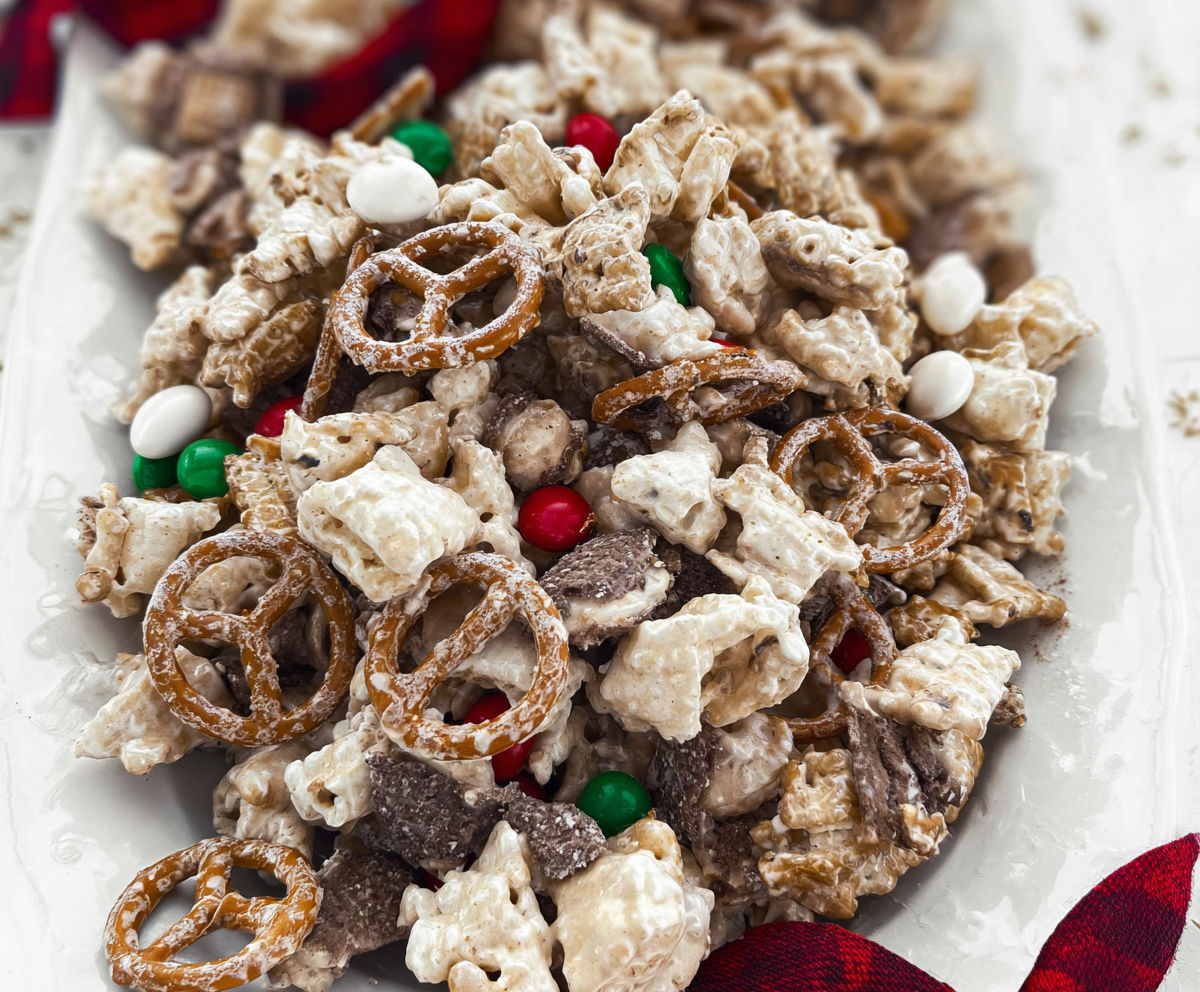 A plate of cereal with marshmallows and candy canes.