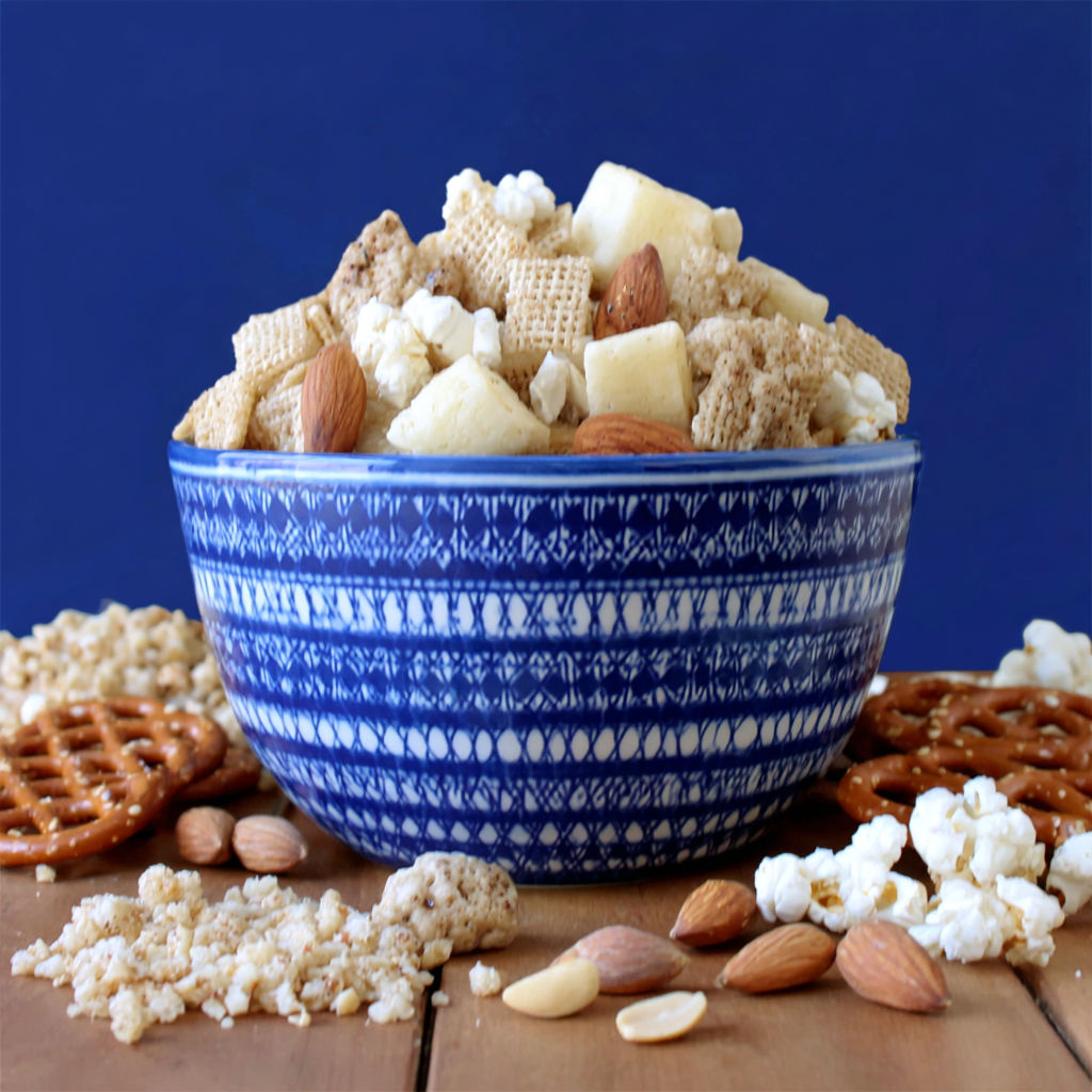 A bowl of food with a blue and white design.