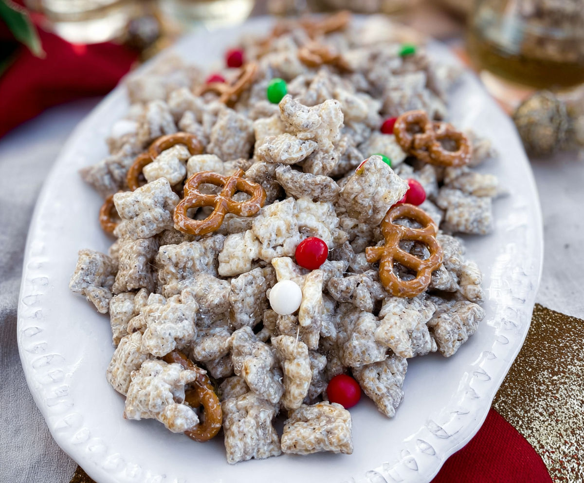 A plate of cereal with marshmallows and candy canes.