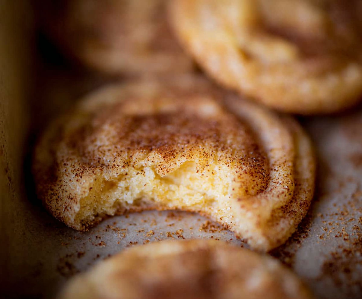 A batch of cookies with cinnamon and sugar.