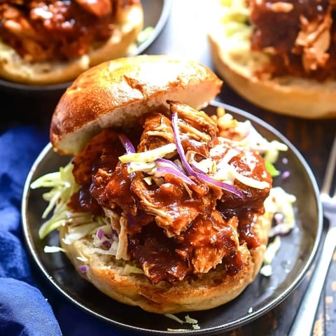 A sandwich with meat and onions.