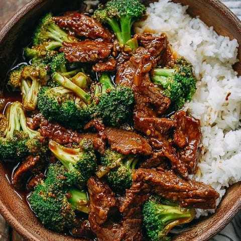 A bowl of beef and broccoli.