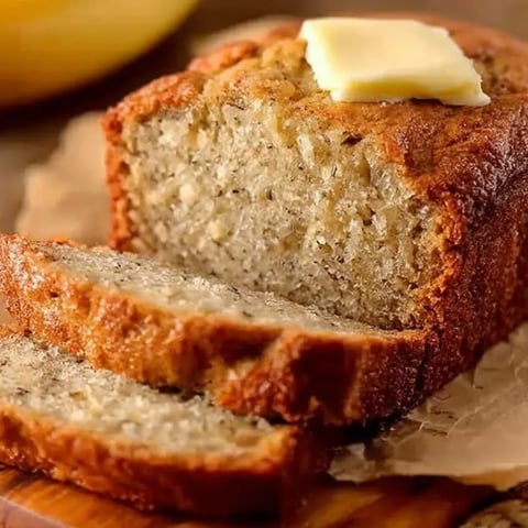 A slice of bread with butter on it.