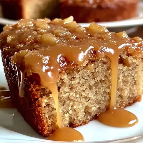 A slice of bread with caramel sauce on it.