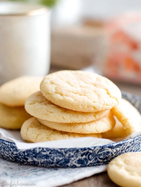 A stack of cookies on a plate.