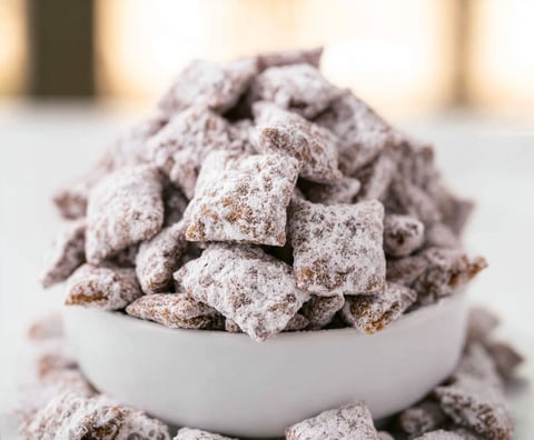 A bowl of sugar covered food.